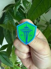 Load image into Gallery viewer, Seattle Sounders Shield Hard Enamel Pin Glow-In-The-Dark